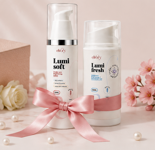 Two white skincare pump bottles labeled 'elvory Lumi soft' and 'elvory Lumi fresh' standing on a round marble tray, best intimate area cream
top rated intimate area whitening 